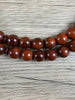 Hidden Gems: Polished Wood Prayer Beads (12mm)