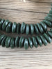 Hidden Gems: Dark Green Ashanti Glass Saucer Beads