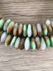 Hidden Gems: Fancy Ashanti Saucer Glass Beads
