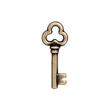Antiqued brass key charm with a trefoil clover-shaped open bow, round shaft and notched bit, shown upright
