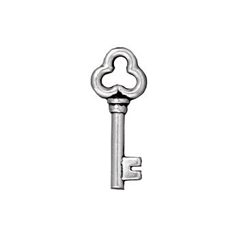 Silver key charm, a smaller crop of the same view showing the three-lobed bow, round shaft and notched bit