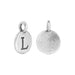 Letter L alphabet charm angled to show the stamped letter, next to the plain smooth back of the pewter disc