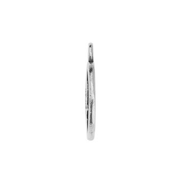 Side view of the silver Gemini zodiac charm showing its thin edge and top loop