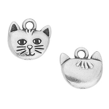 Pewter cat face charm in a slightly closer, tighter crop, front with etched whiskers beside the back with a small fur mark