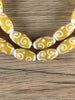 Hidden Gems: Yellow Oval Swirl Java Glass Beads