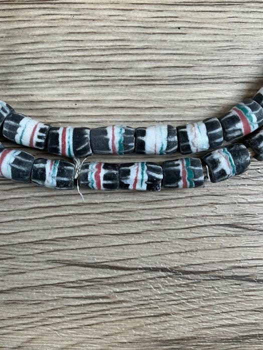 Hidden Gems: Black Strawstack Sandcast Beads