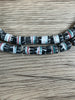 Hidden Gems: Black Strawstack Sandcast Beads