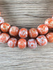 Hidden Gems: Orange Round Patterned Java Glass Beads