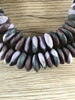Hidden Gems: Fancy Ashanti Saucer Glass Beads