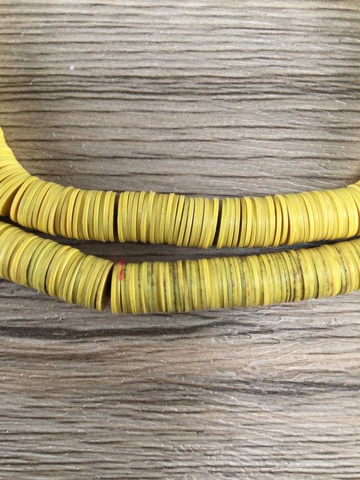 Hidden Gems: Yellow Vinyl Heishi Beads (May Need Cleaning)