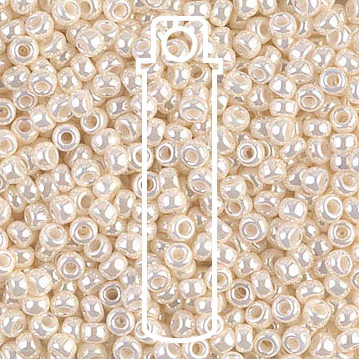 Antique ivory pearl Ceylon Miyuki 8/0 seed beads close-up with a tube outline overlaid on the glossy cream beads