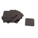 BeadSmith anti-tarnish tabs, a pile of dark gray 1 inch squares with rounded corners and one tab set apart
