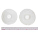 Two bobbins seen from the top with their center holes, placed above an inch ruler to show diameter