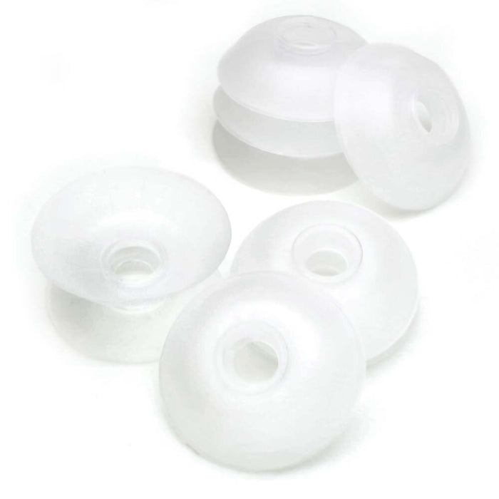 Group of translucent no tangle bobbins viewed from above and the side, showing the center holes