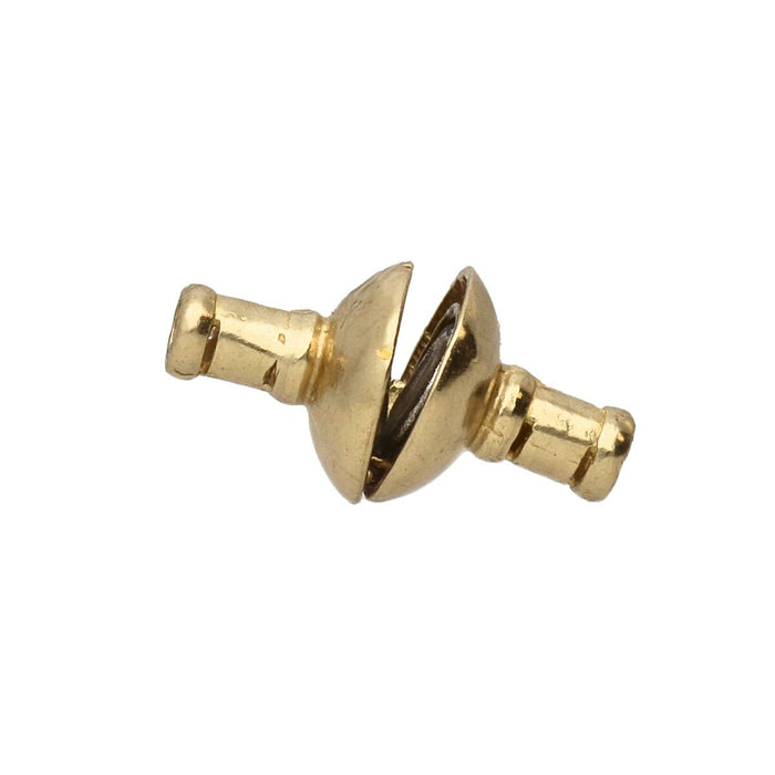 Brass magnetic clasp with the two halves slightly parted at the middle