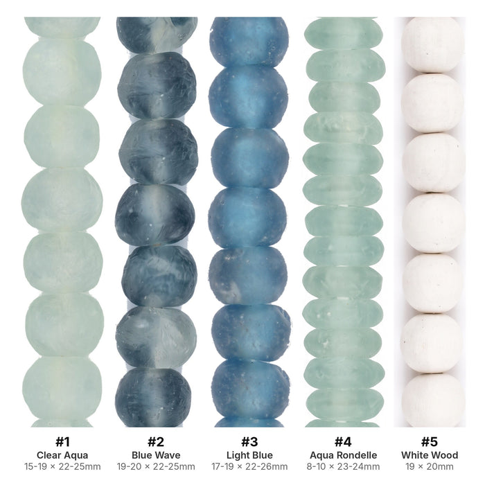 Jumbo recycled glass beads with labeled sizes for each of the five strands, from clear aqua to white wood