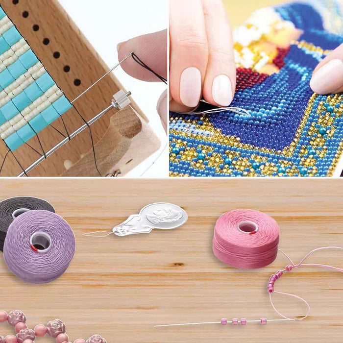 Beading needles in use for loom weaving and bead embroidery, with thread spools and a needle threader below