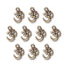 Antiqued brass open Om charms arranged in rows, ten pewter charms with loops at the top