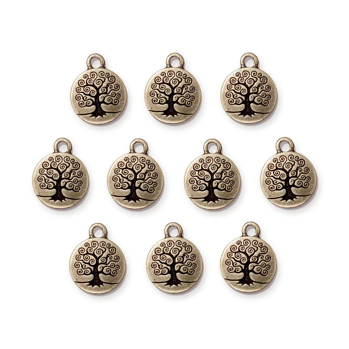 Antiqued brass tree of life charms laid out in rows, ten round pewter charms with loops