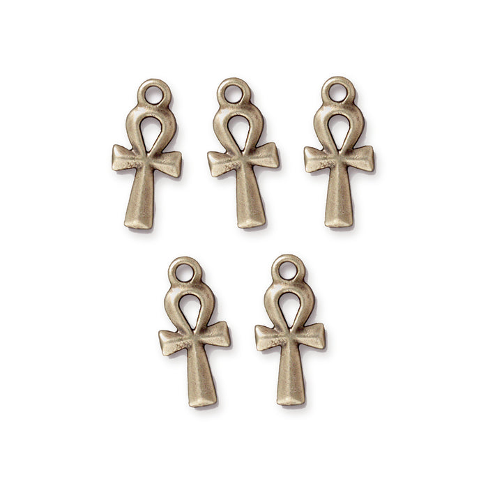 Antiqued brass ankh charms, five pewter charms arranged in two rows on a white background