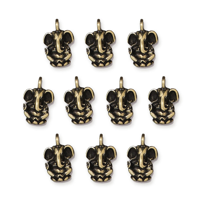 Antiqued brass Ganesh charms arranged in rows of three, four and three on a white background