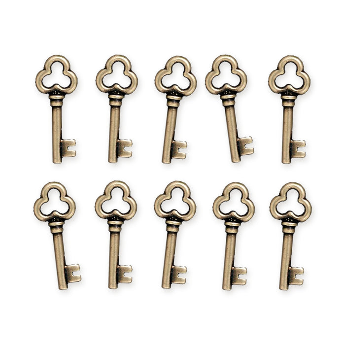 Antiqued brass key charms with trefoil bows, ten arranged in two rows
