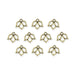 Antiqued brass open lotus charms, ten pewter charms arranged in rows on white