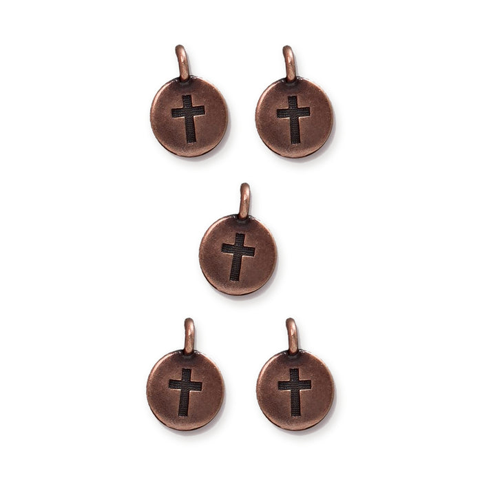 Five antiqued copper cross charms with loops, arranged in a group on a white background