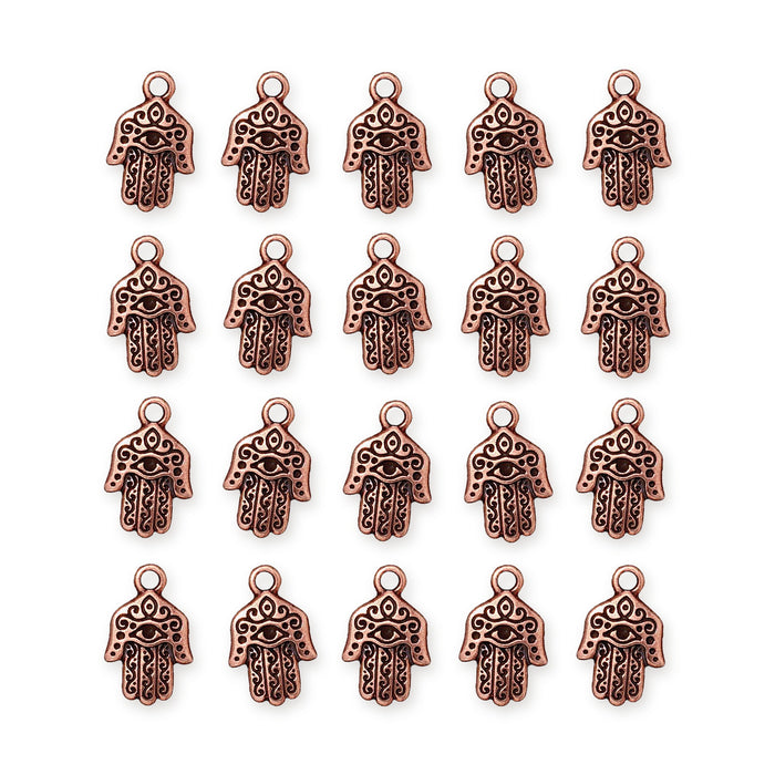 Antiqued copper hamsa hand charms arranged in a grid of four rows of five