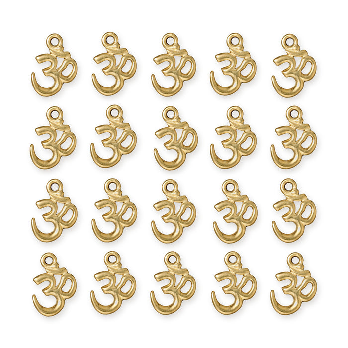 Gold plated open Om charms arranged in four rows of five on a white background