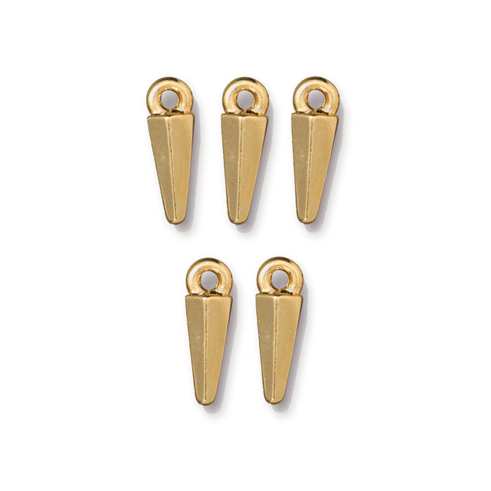 Gold plated small dagger charms, five pieces arranged in two rows on a white background