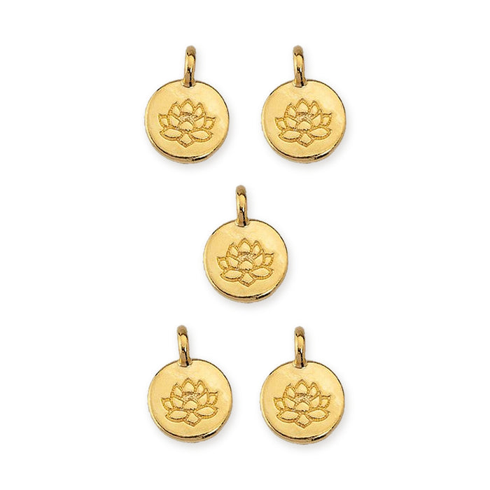 Five gold plated lotus charms, round coin shape with loop, arranged on a white background
