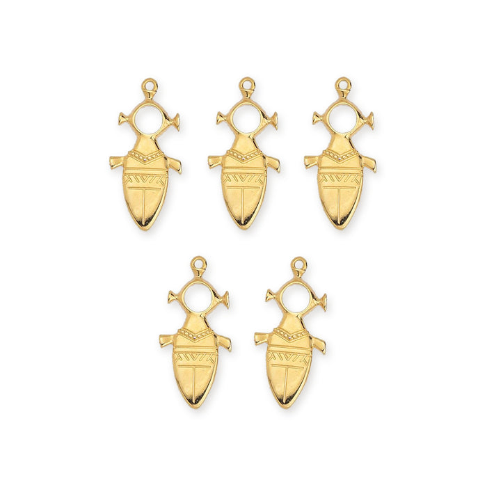 Five 24K gold plated Tuareg motif pendants laid out in two rows on a white background