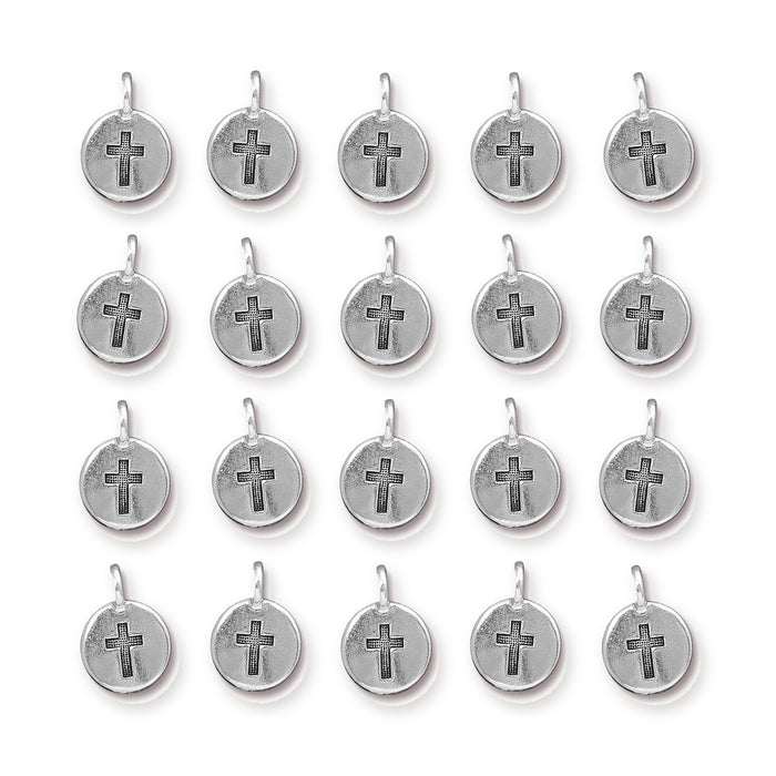 Antiqued silver cross charms, round pewter with loops, laid out in a grid of four rows of five