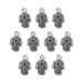 Antiqued silver hamsa hand charms with eye design, ten charms arranged in rows on white