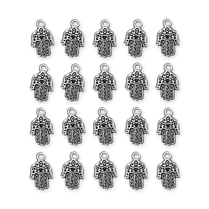 Antiqued silver hamsa hand charms arranged in four rows of five on a white background
