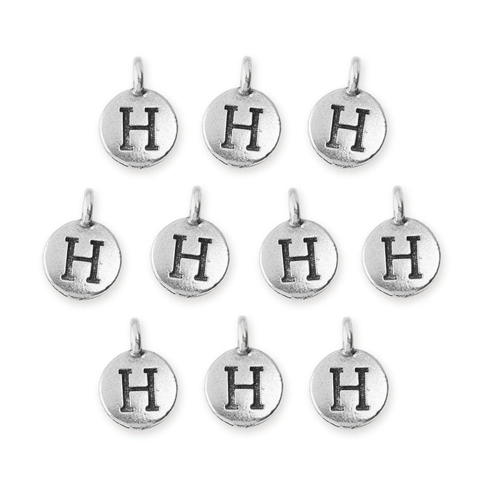 Antiqued silver letter H charms, ten round pewter charms with loops arranged in rows