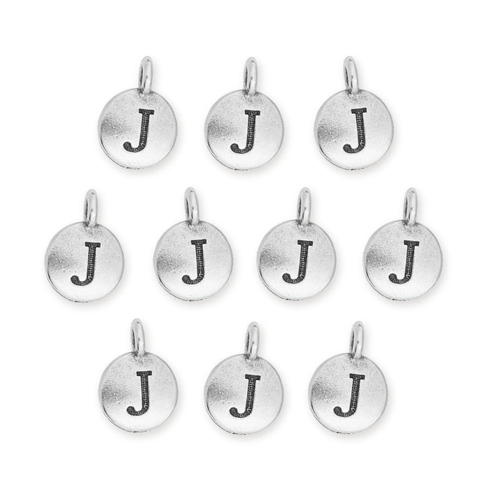 Antiqued silver letter J charms, ten round pewter charms with jump rings arranged in rows