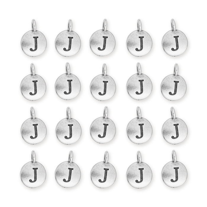 Antiqued silver letter J charms laid out in a grid of four rows of five round pewter charms with loops