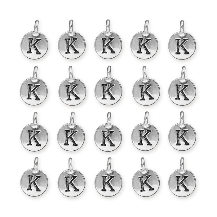 Antiqued silver letter K charms, twenty round pewter charms arranged in four rows of five