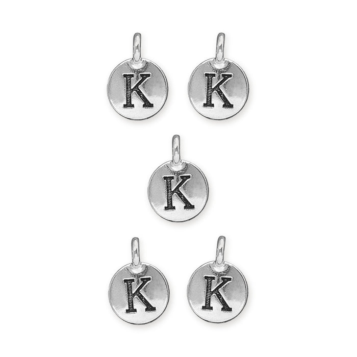 Antiqued silver letter K charms, five round pewter discs with loops arranged in a group