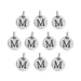 Antiqued silver letter M charms, ten round pewter charms with loops laid out in rows