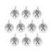 Antiqued silver letter X charms, ten round pewter charms laid out in rows