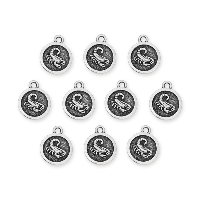 Antiqued silver Scorpio zodiac charms with scorpion design, ten round pewter charms with loops laid out in rows