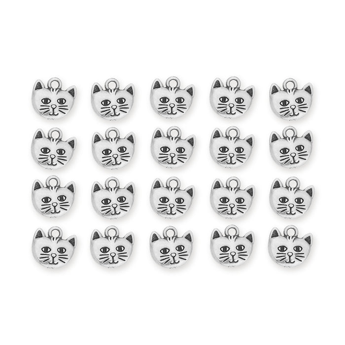 Antiqued silver whiskers cat face charms arranged in four rows of five on a white background