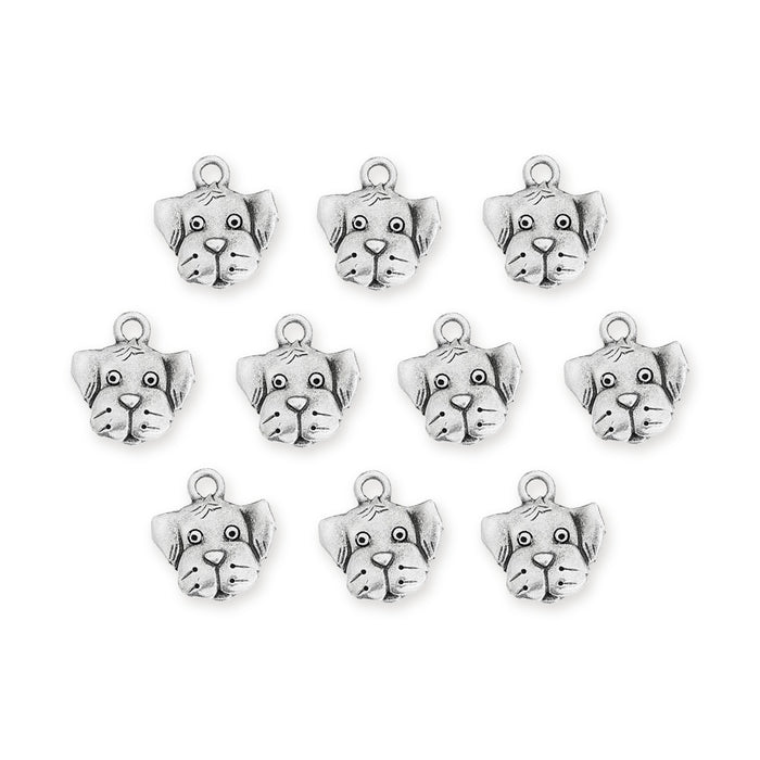 Antiqued silver dog face charms, ten pewter charms with loops arranged in rows on a white background
