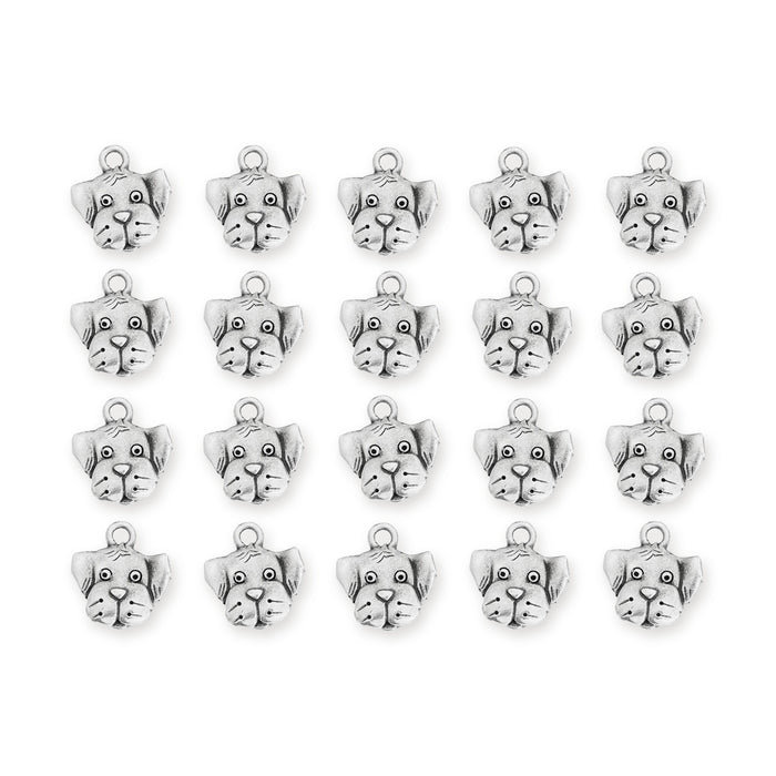 Antiqued silver dog face charms, 20 pewter charms arranged in four rows of five on white