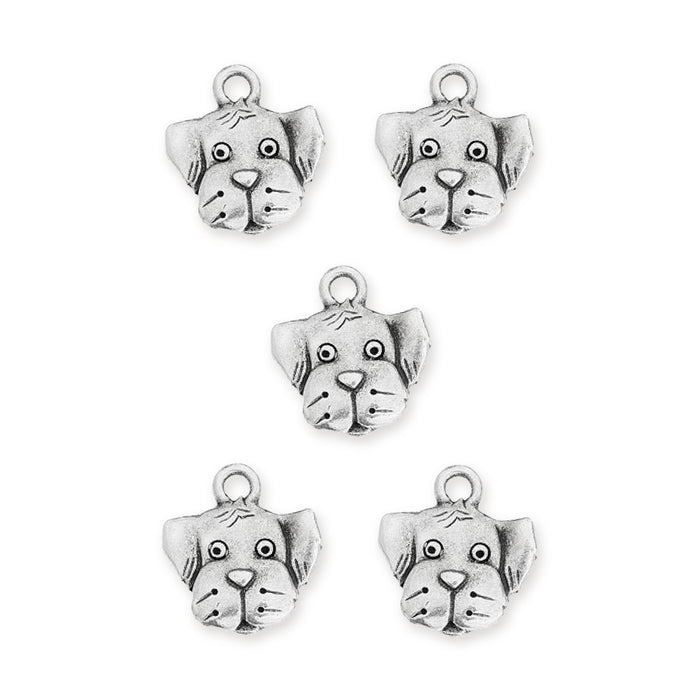 Antiqued silver dog face charms, five pewter charms with loops arranged on a white background