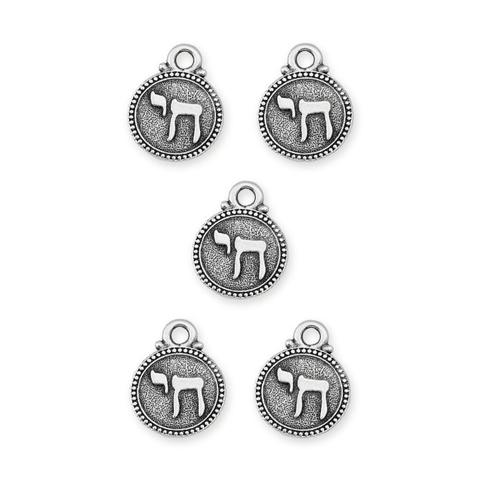 Antiqued silver chai charms, five round pewter pendants with a beaded rim and Hebrew chai symbol on a white background