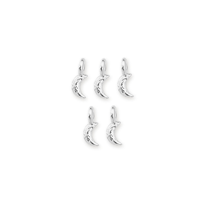 Shiny silver crescent moon charms, five pewter charms with hammered texture and loops arranged on white
